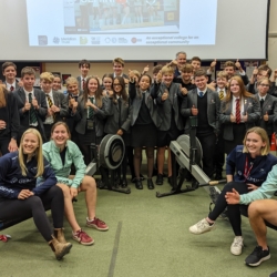 A photo of Ely College students and the boat race athletes
